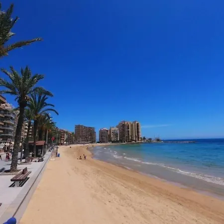 شقة Espana - Punta Prima Orihuela Costa - Large For 6-people 85m2 And Terrace 40m2 Air Conditioning Wi-fi Living Kitchen 2 Bedrooms 2 Bathrooms 3 Swimming Pools Parking Security To The Sea 200m Only 40 Min To The Airport تورّيفيِخا